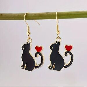 Black Cat Balancing Heart on Tale
